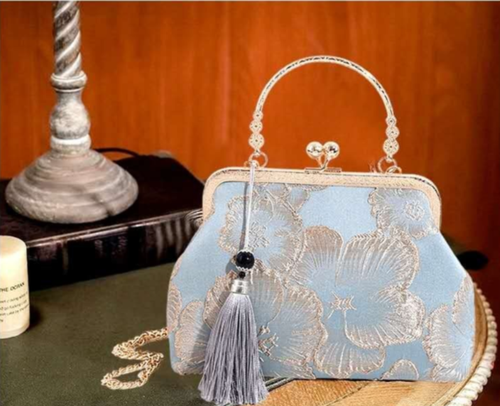 Pochette da sera vintage in broccato floreale, borsa a mano con nappa e catena