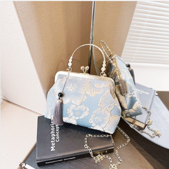 Pochette da sera vintage in broccato floreale, borsa a mano con nappa e catena