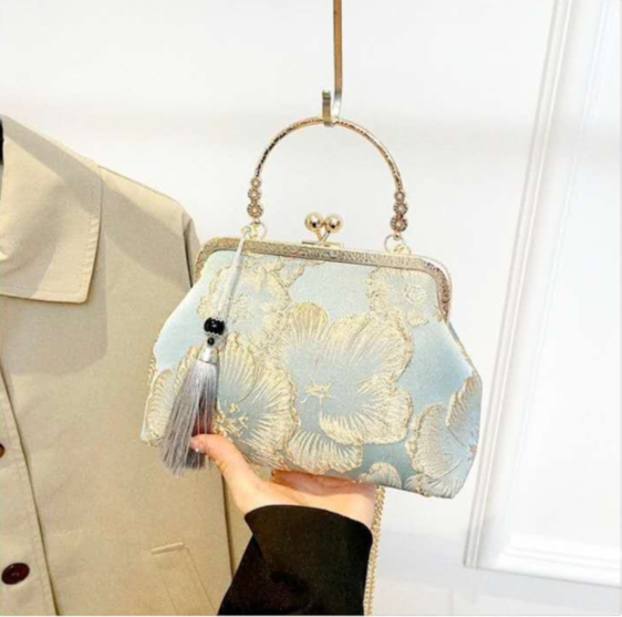 Pochette da sera vintage in broccato floreale, borsa a mano con nappa e catena