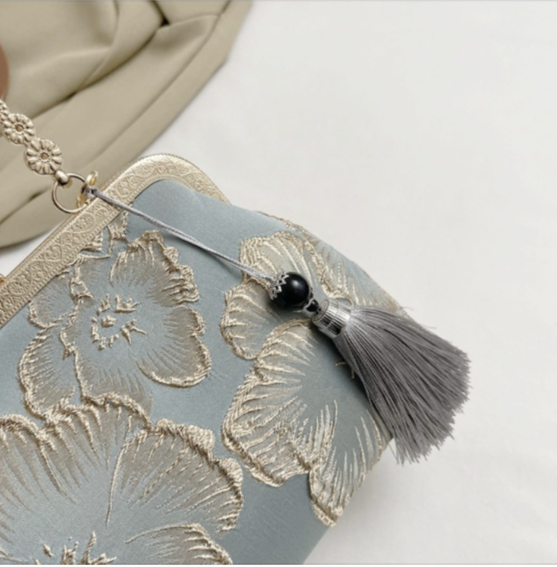 Pochette da sera vintage in broccato floreale, borsa a mano con nappa e catena