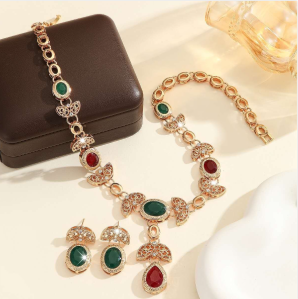 Set collana e orecchini con zirconi smeraldo e rosso