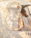 Collana vintage a doppio filo di perle lunga