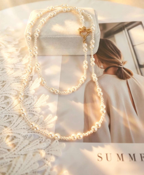 Collana vintage a doppio filo di perle lunga