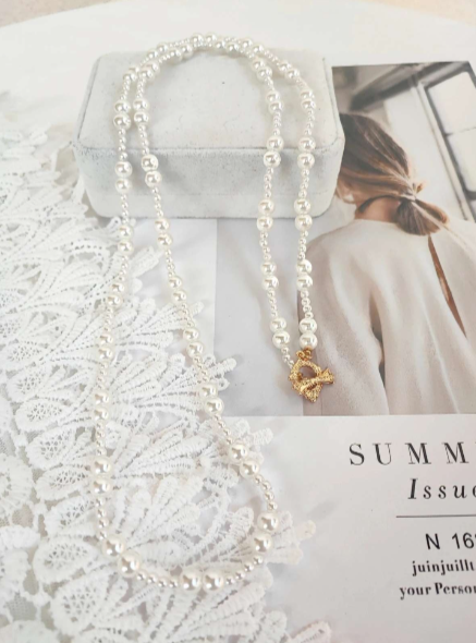 Collana vintage a doppio filo di perle lunga