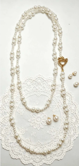 Collana vintage a doppio filo di perle lunga