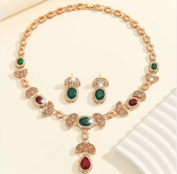 Set collana e orecchini con zirconi smeraldo e rosso