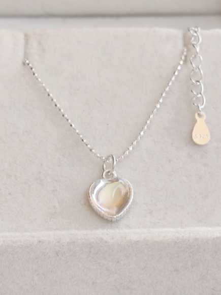 925 sterling silver necklace with heart-shaped opal stone pendant