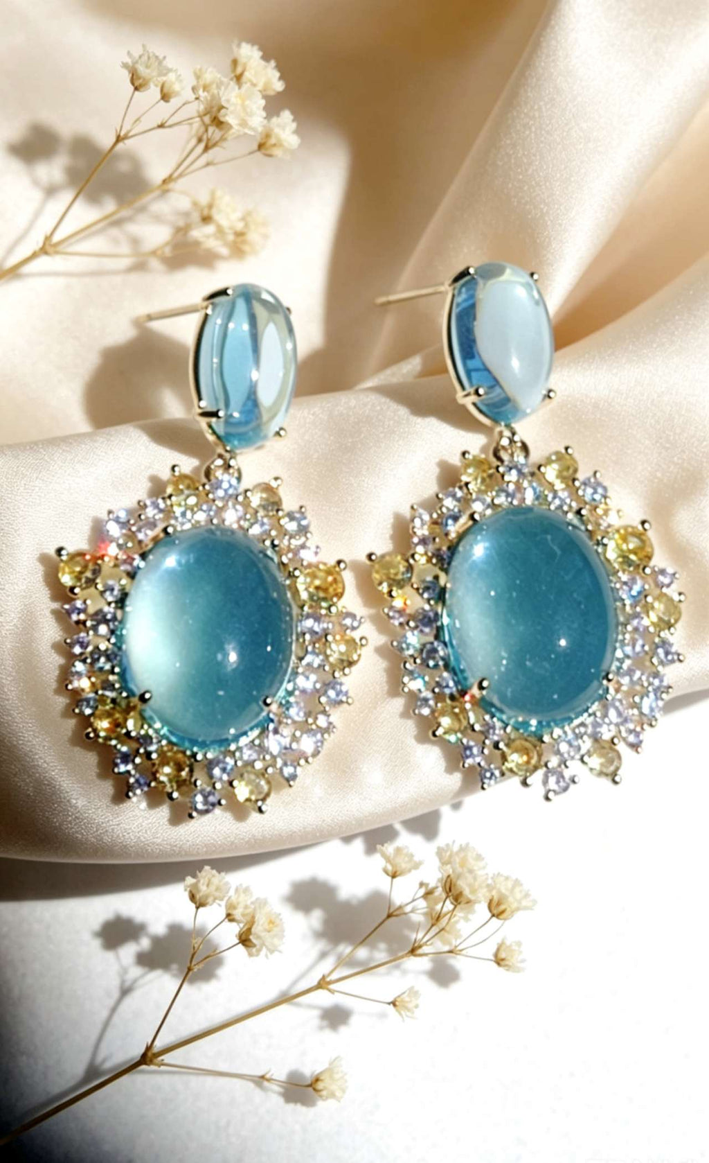 Orecchini pendenti con zircone blu acquamarina, perni in argento sterling