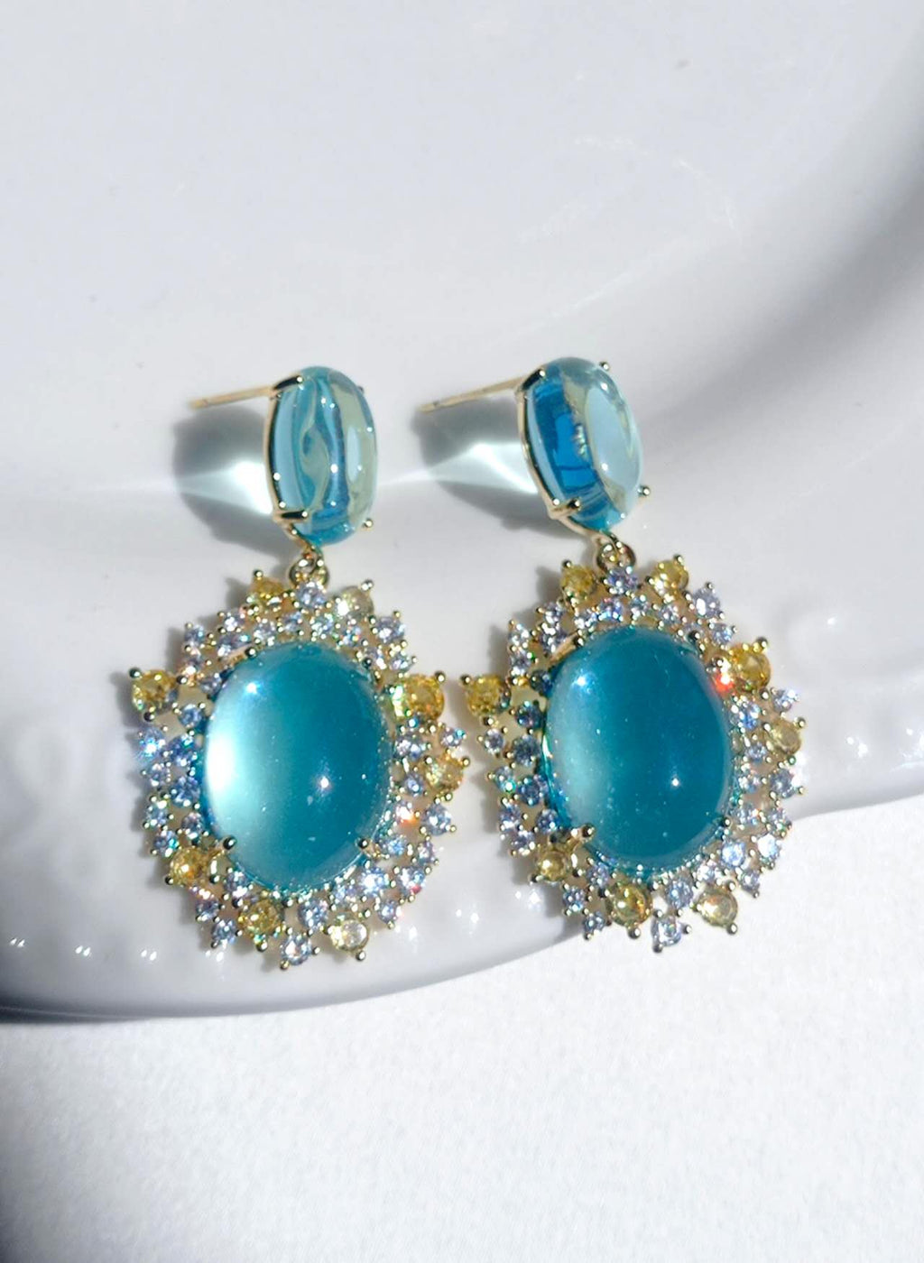 Orecchini pendenti con zircone blu acquamarina, perni in argento sterling