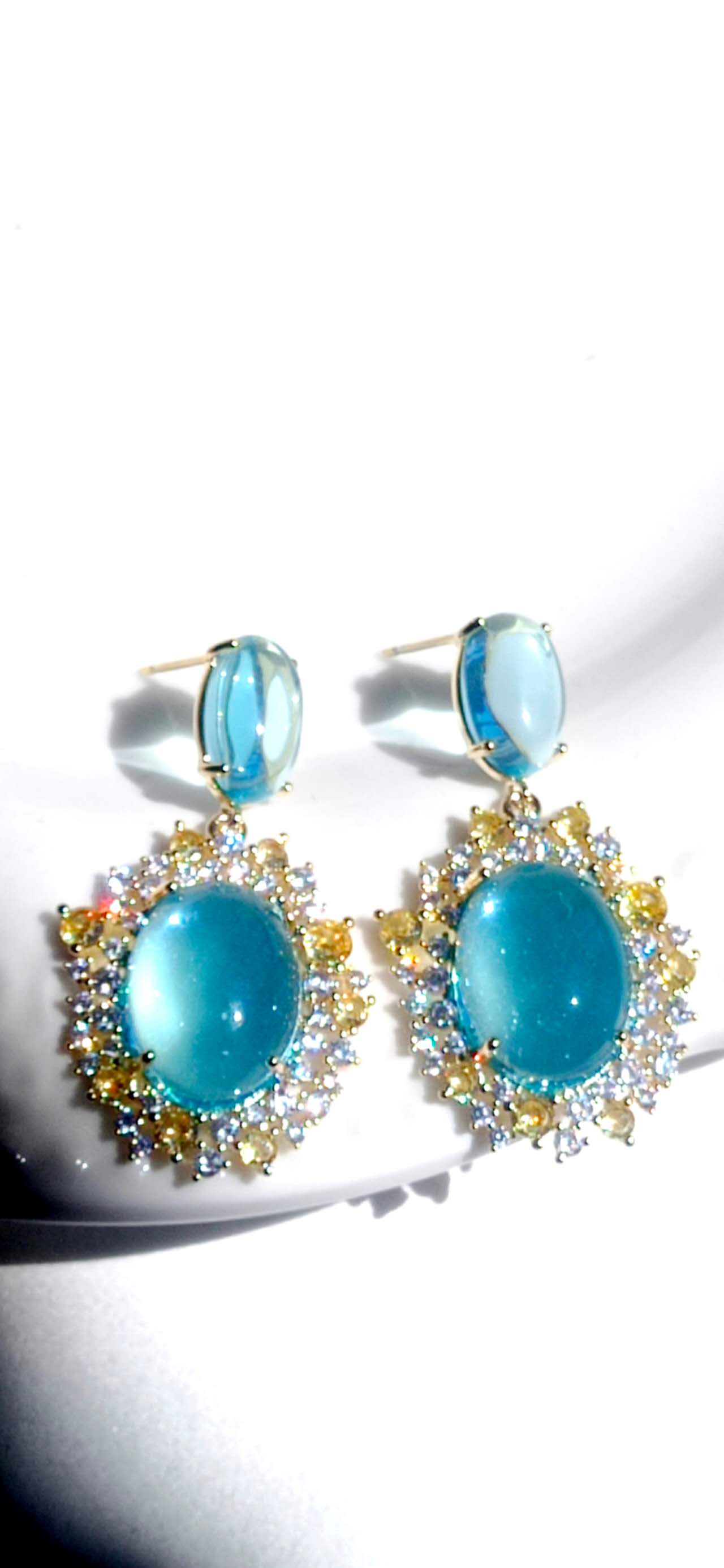 Orecchini pendenti con zircone blu acquamarina, perni in argento sterling
