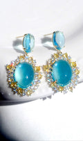 Orecchini pendenti con zircone blu acquamarina, perni in argento sterling