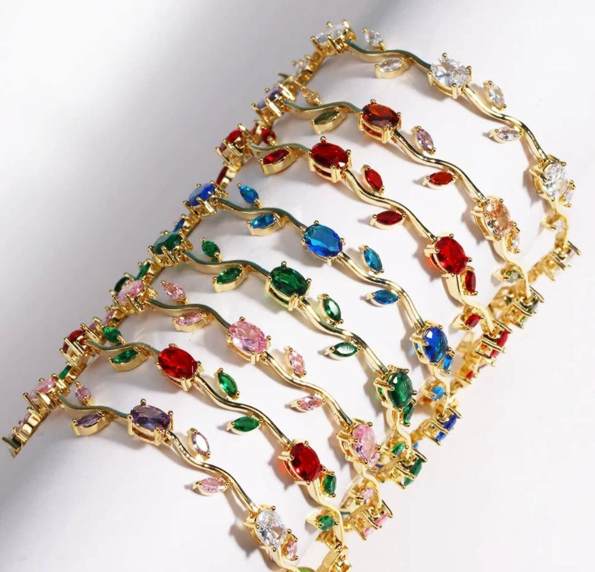 Bracciale placcato oro con foglie e zirconi, cristalli ovali multicolor