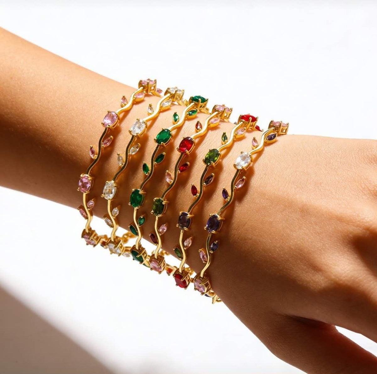Bracciale placcato oro con foglie e zirconi, cristalli ovali multicolor