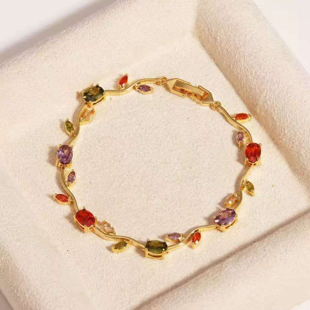 Bracciale placcato oro con foglie e zirconi, cristalli ovali multicolor