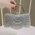 Elegante borsa con nappe e strass