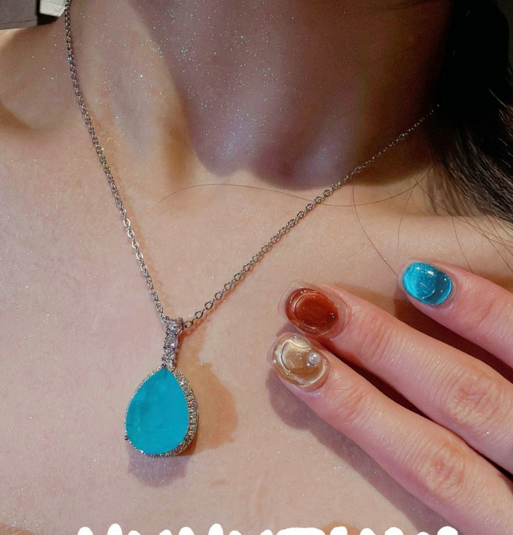 Set di collana e orecchini con zirconi stile Paraiba blu neon, placcato argento