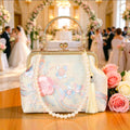 Bestickte Abendclutch im orientalischen Stil mit Perlen und Quasten