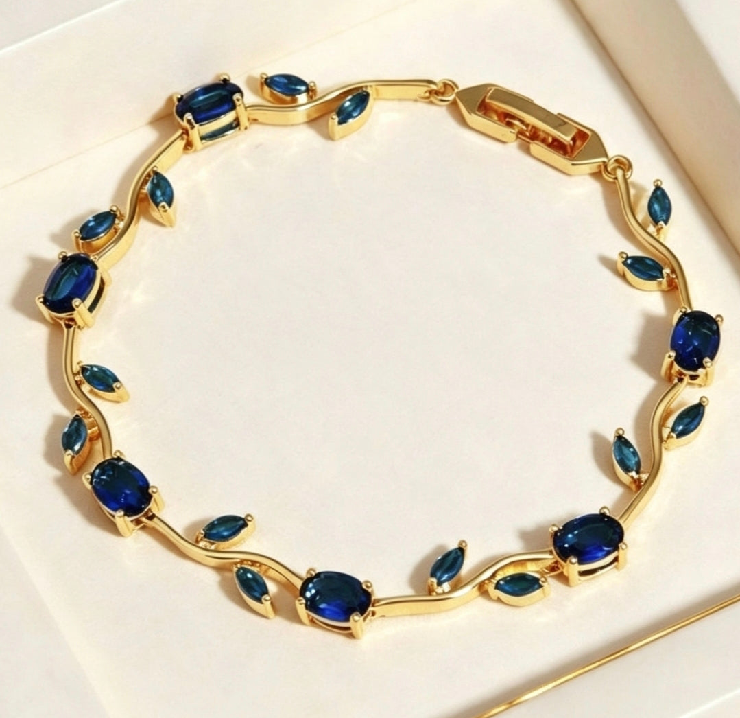 Bracciale placcato oro con foglie e zirconi, cristalli ovali multicolor