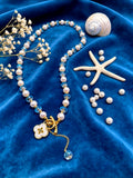 Set collana+bracciale con perle naturali e cristallo cangiante blu, trifoglio