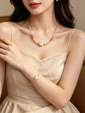 Set Elegante con Perla Barocca e Pietra Sole, Collana e Bracciale