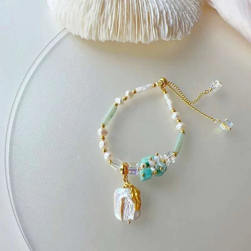 Bracelet with natural pearls, real stones, shells and natural baroque pearl