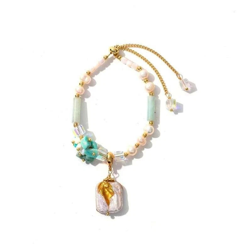 Bracelet with natural pearls, real stones, shells and natural baroque pearl