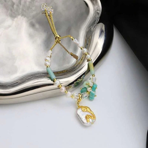 Armband mit Naturperlen, echten Steinen, Muscheln und einer natürlichen Barockperle