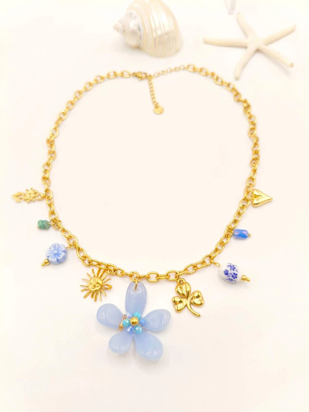 Halskette aus Edelstahl mit Harz- und Keramikblumen
