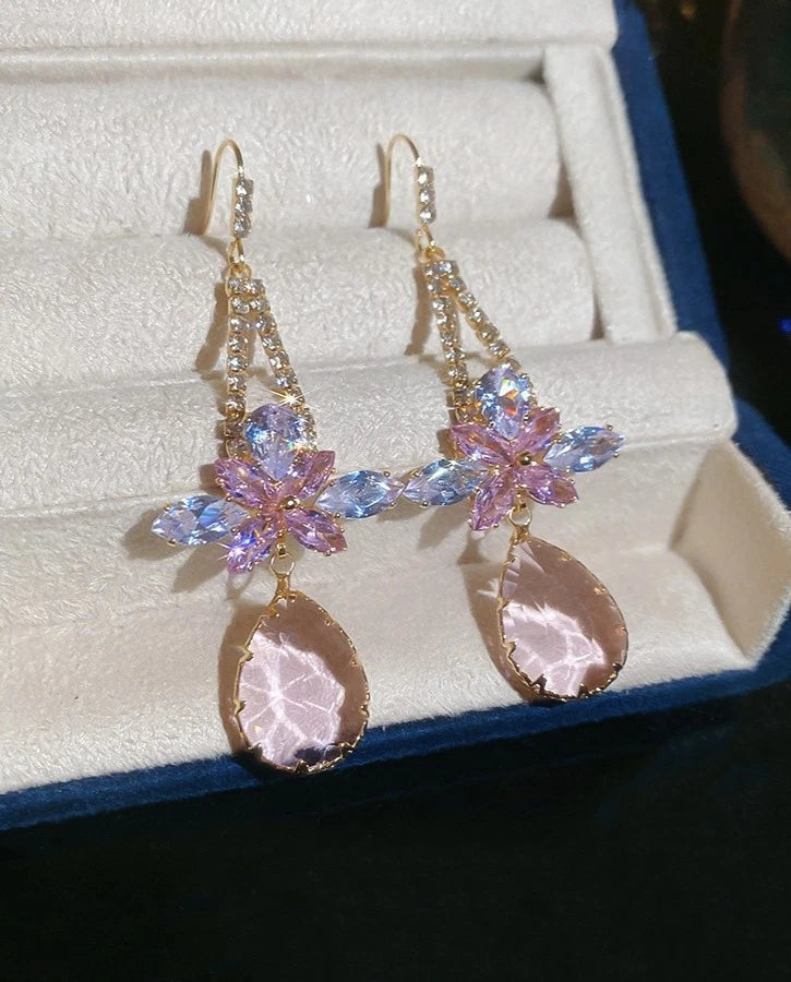 Condividi Orecchini pendenti con zircone e brillantini forma di goccia (ago d'argento)