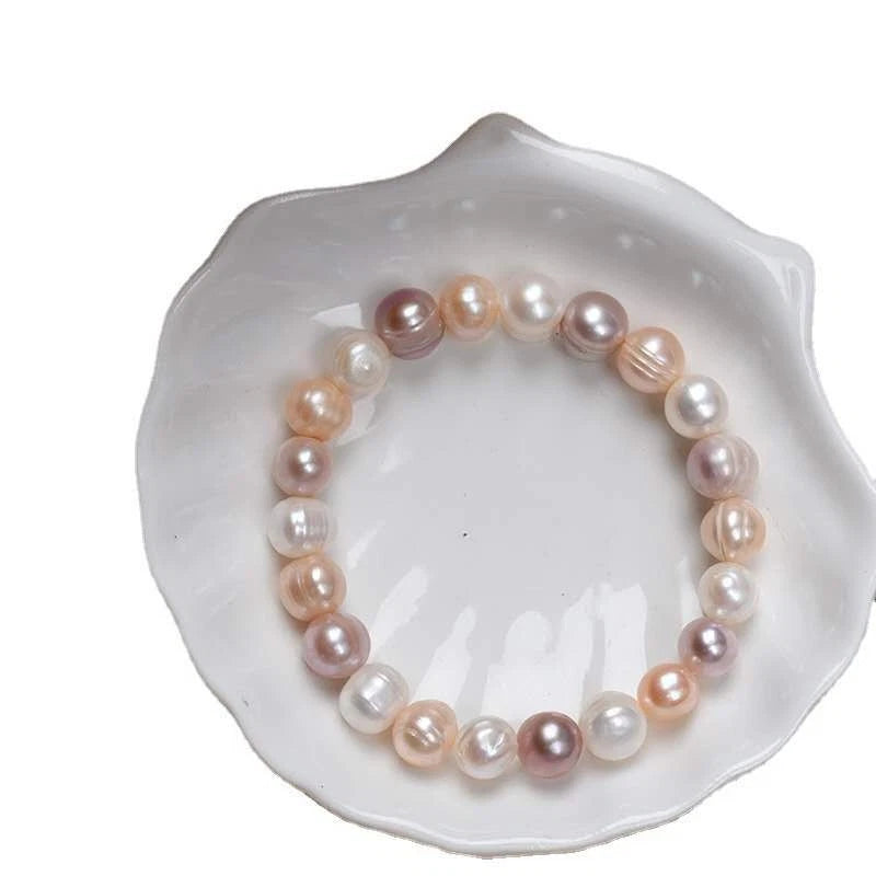 Elastisches Armband mit natürlichen Süßwasserperlen 9mm „Milchiger Pfirsich“