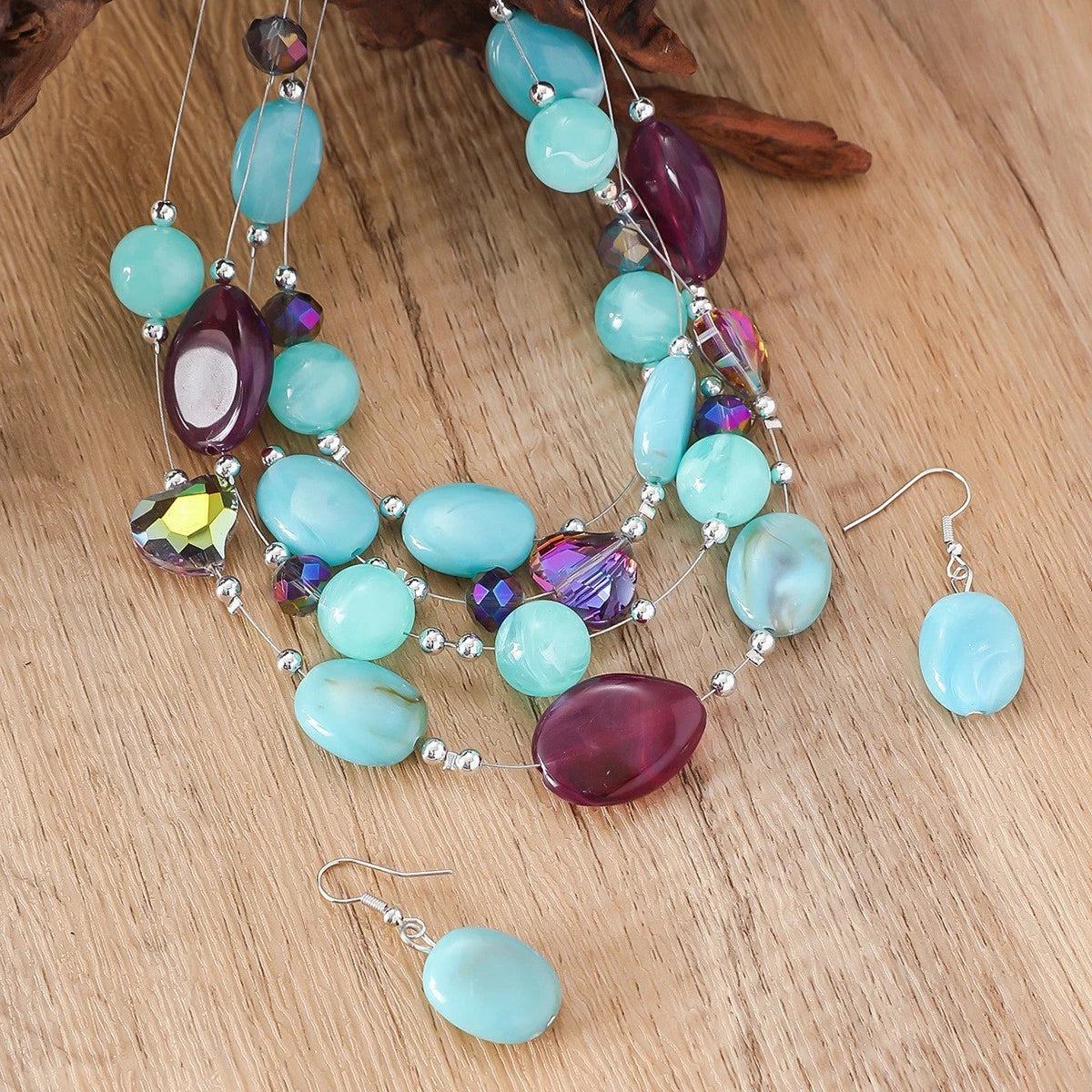 Fashion Set aus mehrschichtigen Kristallen und gefärbtem Glas mit Quasten, 2-teilig