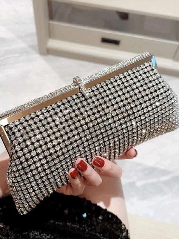 Pochette da sera a mano con strass e cornice metallica