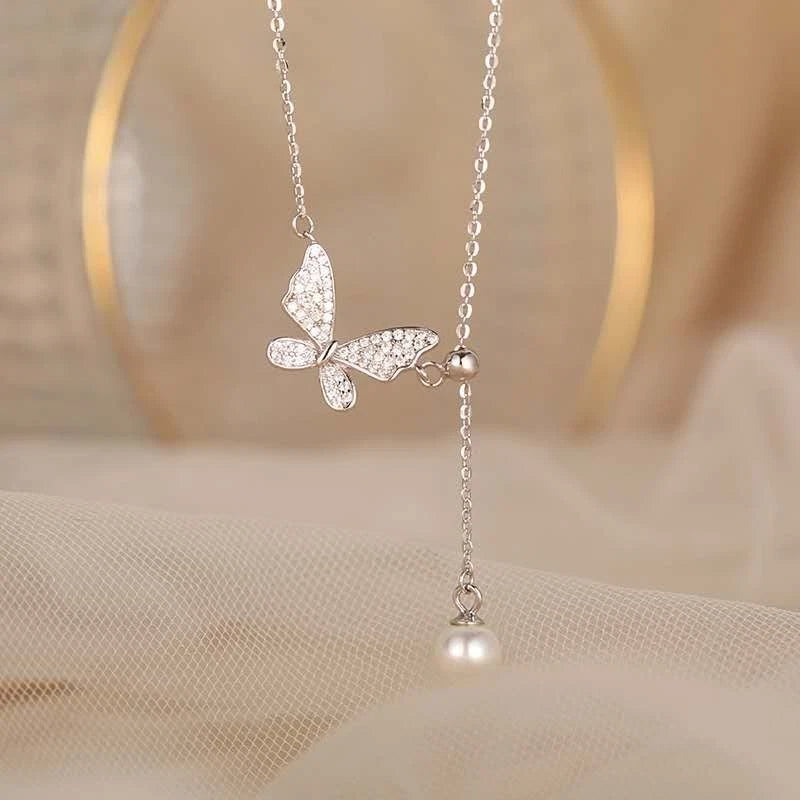 Trendy collana in argento 925 con ciondolo farfalla e perla