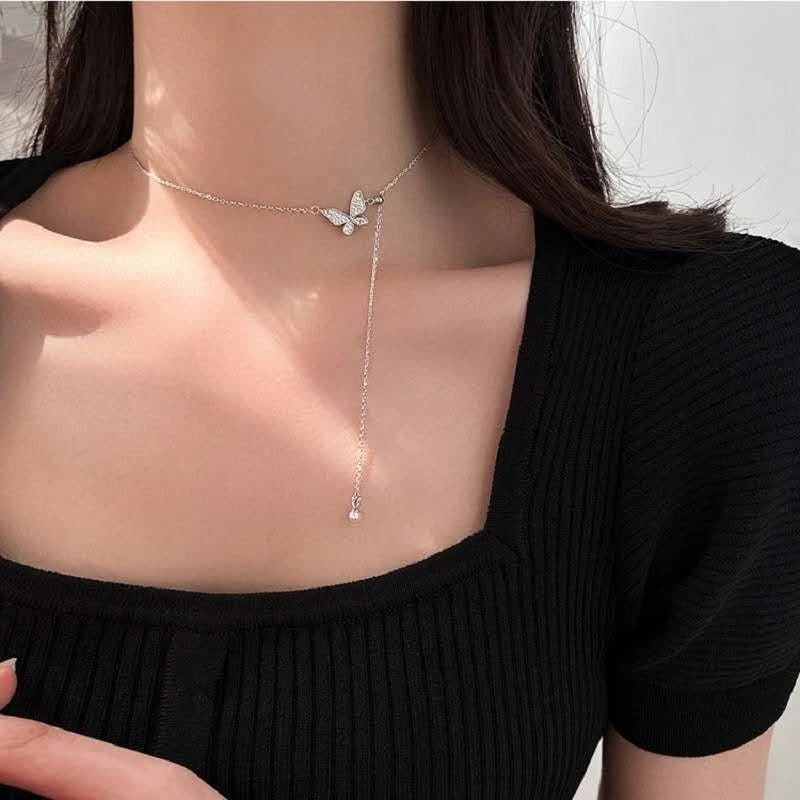 Trendy collana in argento 925 con ciondolo farfalla e perla