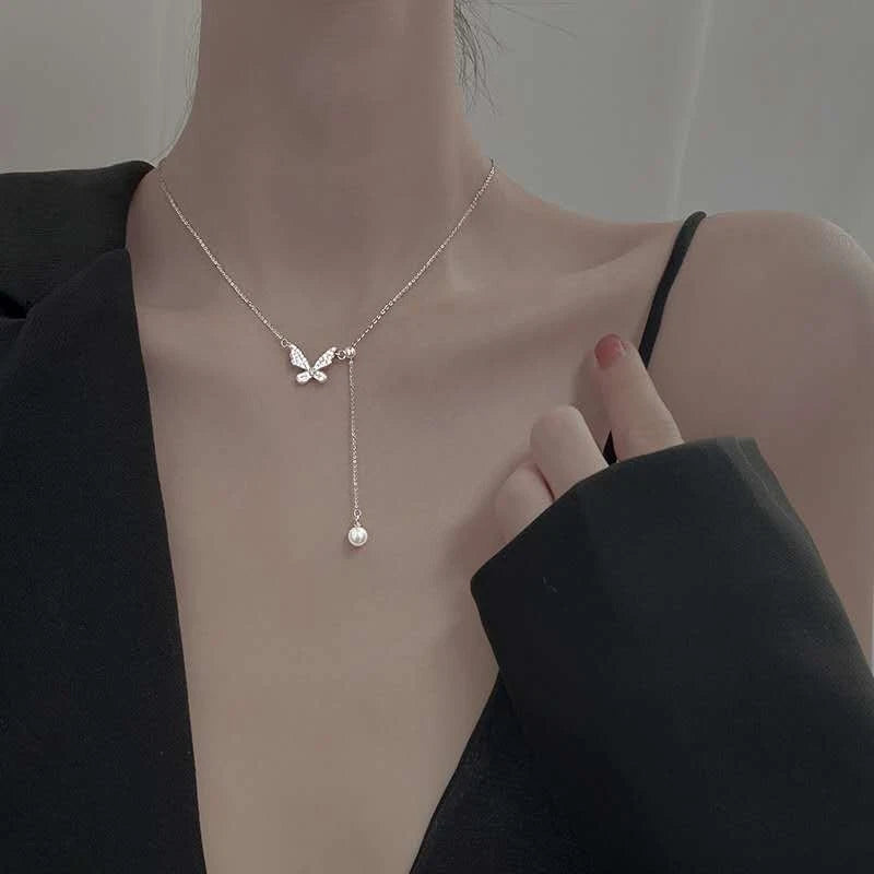 Trendy collana in argento 925 con ciondolo farfalla e perla