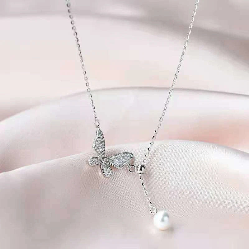 Trendy collana in argento 925 con ciondolo farfalla e perla