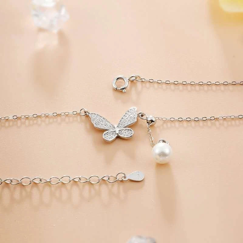 Trendy collana in argento 925 con ciondolo farfalla e perla