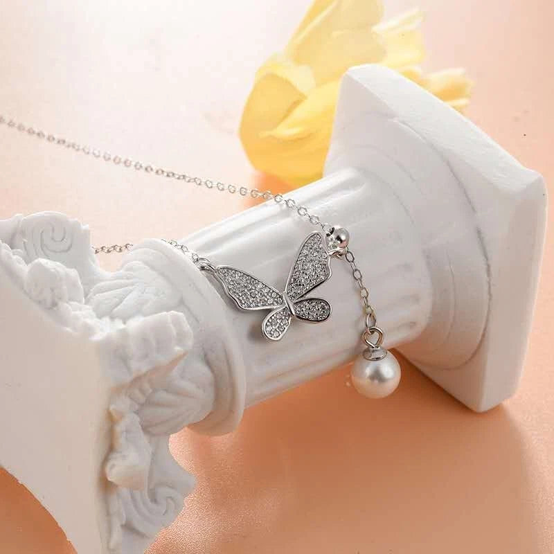 Trendy collana in argento 925 con ciondolo farfalla e perla