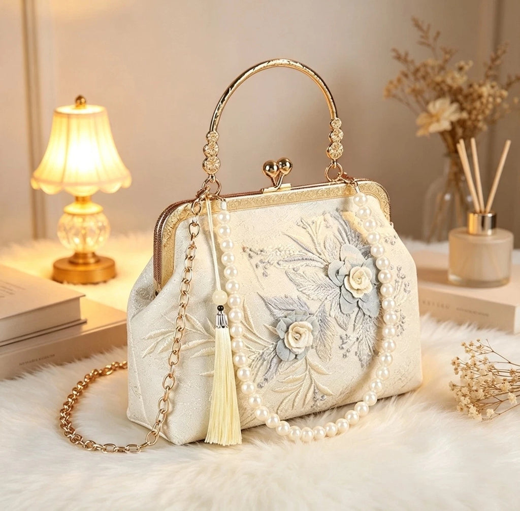 Pochette da sera in seta con ricamo floreale, borsa a mano con perle e nappa