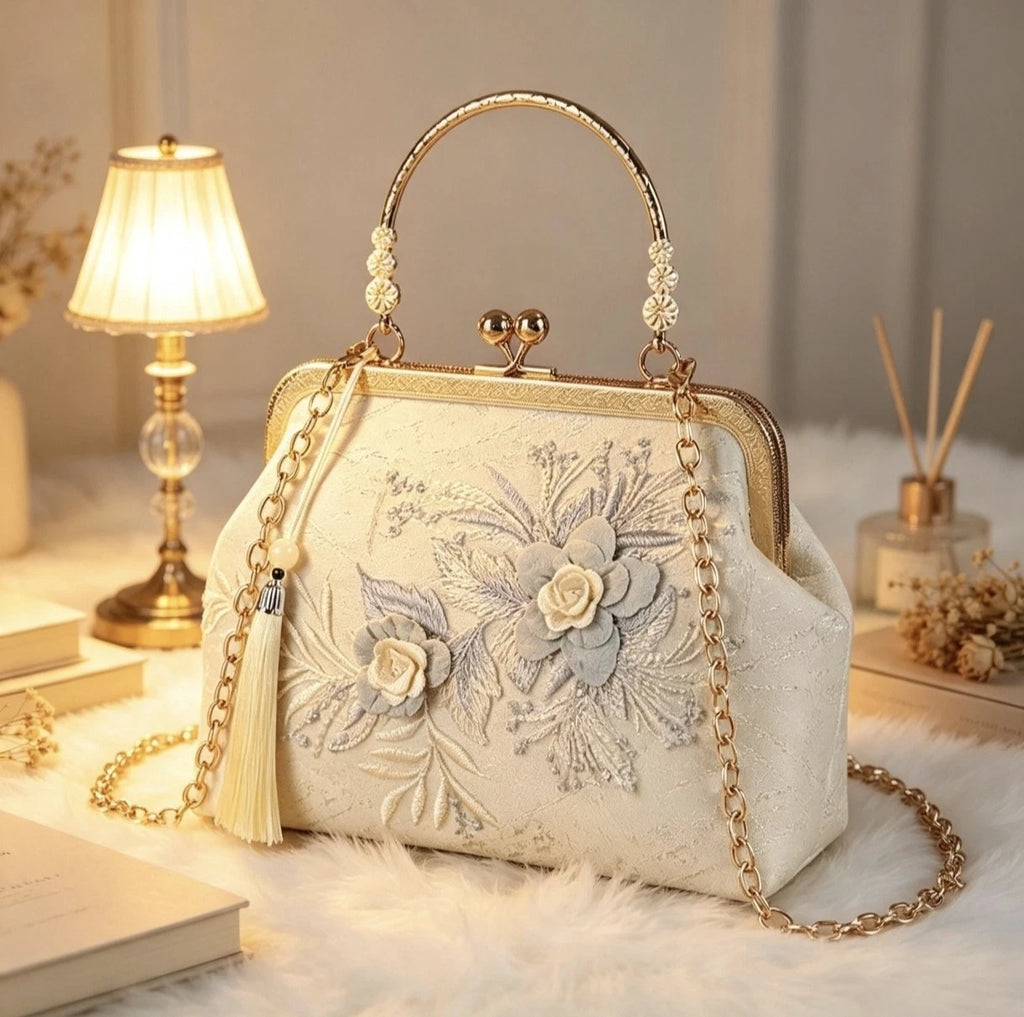 Pochette da sera in seta con ricamo floreale, borsa a mano con perle e nappa