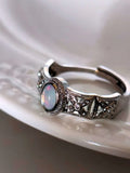 Ring mit Öffnung und Opalstein