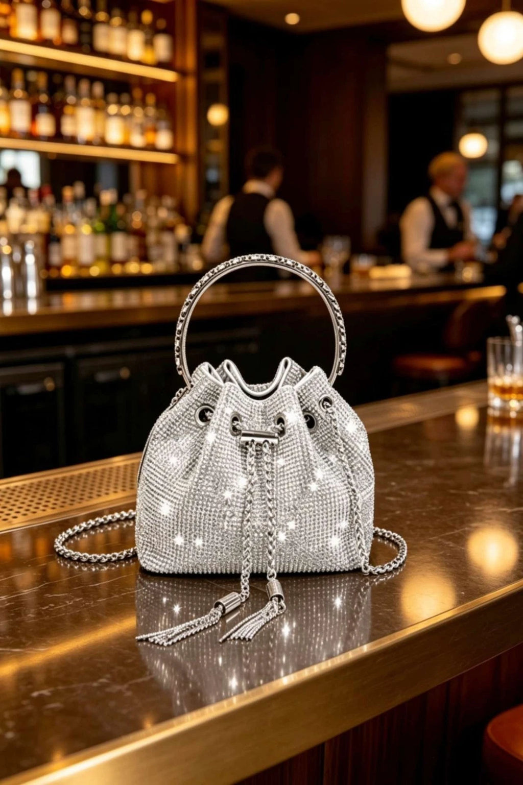 Evening rhinestone bucket bag with chain strap and rhinestone handle