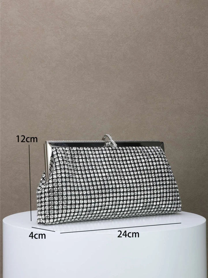 Pochette da sera a mano con strass e cornice metallica