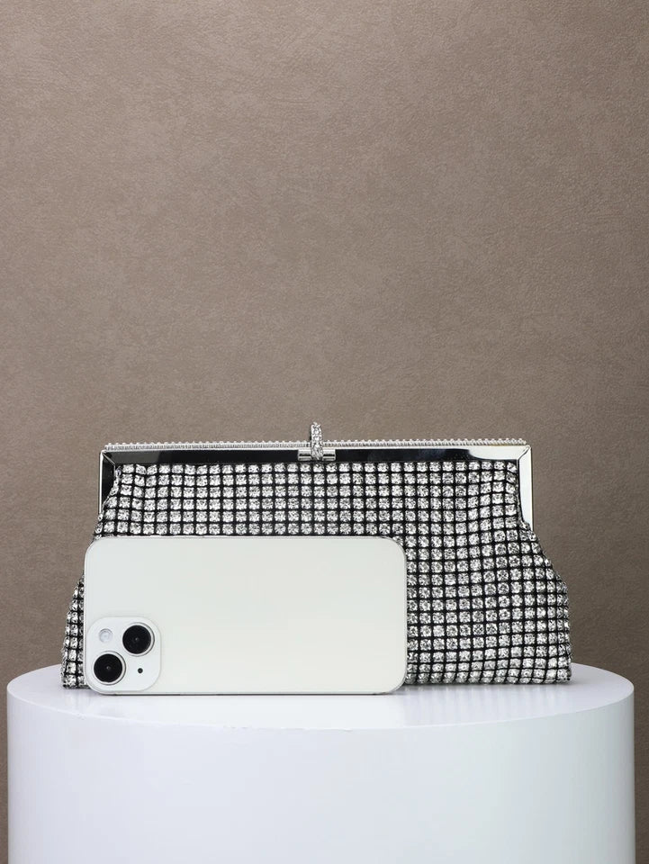 Pochette da sera a mano con strass e cornice metallica