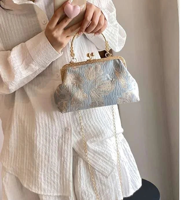 Pochette da sera con ricamo floreale, a mano o a tracolla