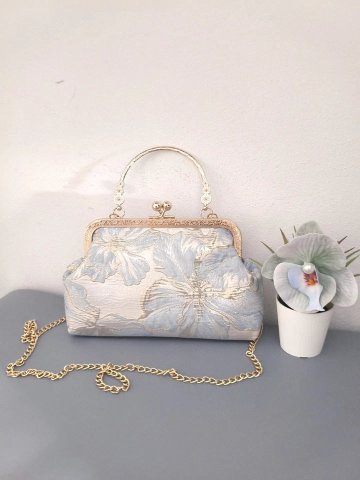 Pochette da sera con ricamo floreale, a mano o a tracolla